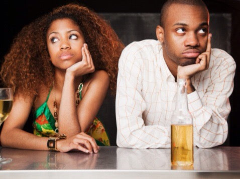 woman and man sitting together looked uninterested